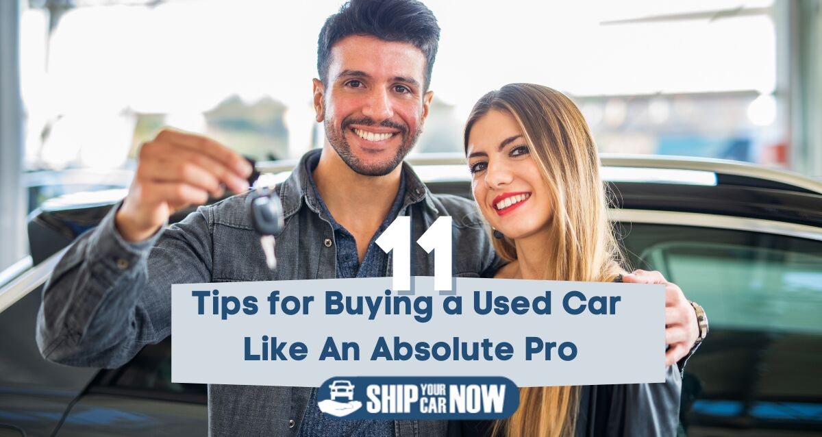 couple standing in front of a used car tyhey just purchased