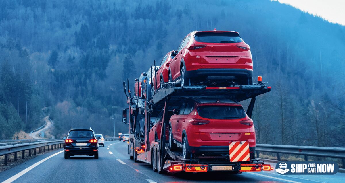 Several cars on an open transport